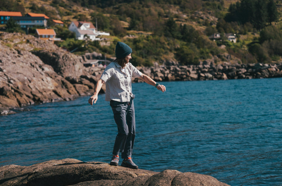 BD athlete Collette Mcinerney stands on a lake shore
