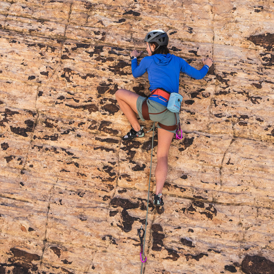 A climber on a sandstone wall. 