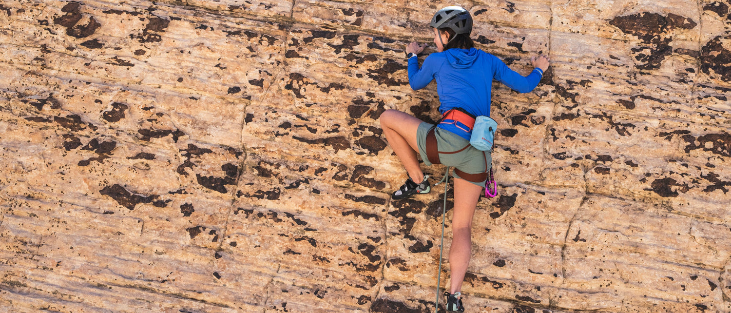 A climber on a sandstone wall. 
